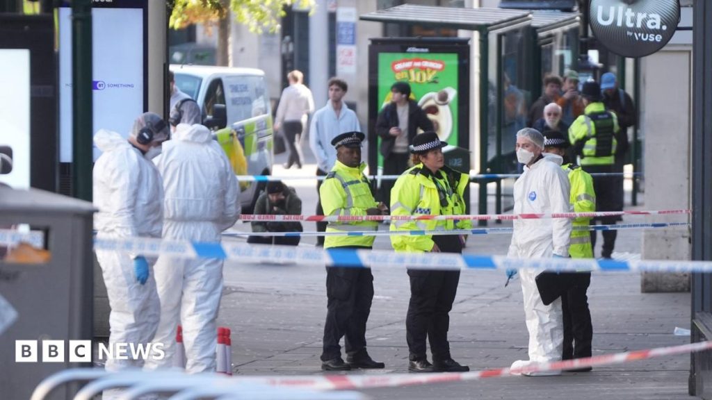 Four arrested after police officer injured in shooting Four arrested after police officer injured in shooting