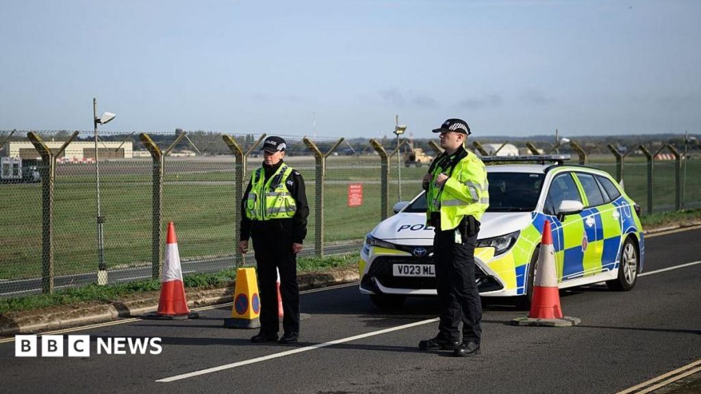 Two re-arrested on suspicion of assisting Iran intelligence after RAF Fairford incident Two re-arrested on suspicion of assisting Iran intelligence after RAF Fairford incident