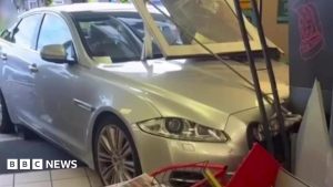 Car crashes into Tonteg shop famous for gran stuck on a shutter