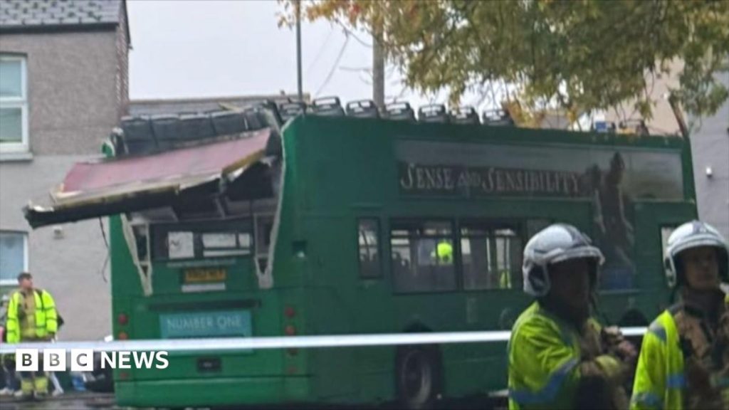 Three children injured after school bus roof ripped off in crash Three children injured after school bus roof ripped off in crash