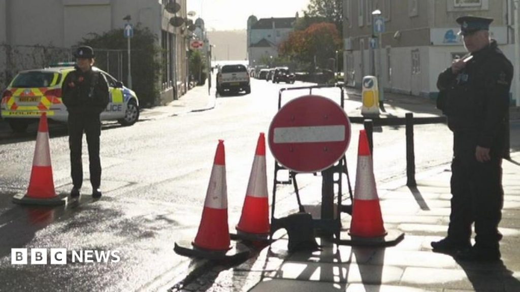 Murder charge after body found in wheelie bin
